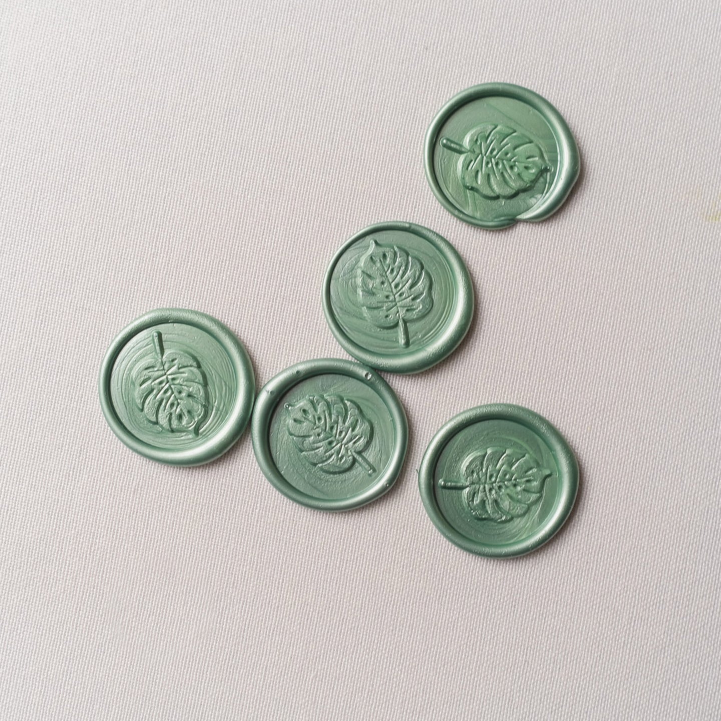 wax seals with montserrat leaf
